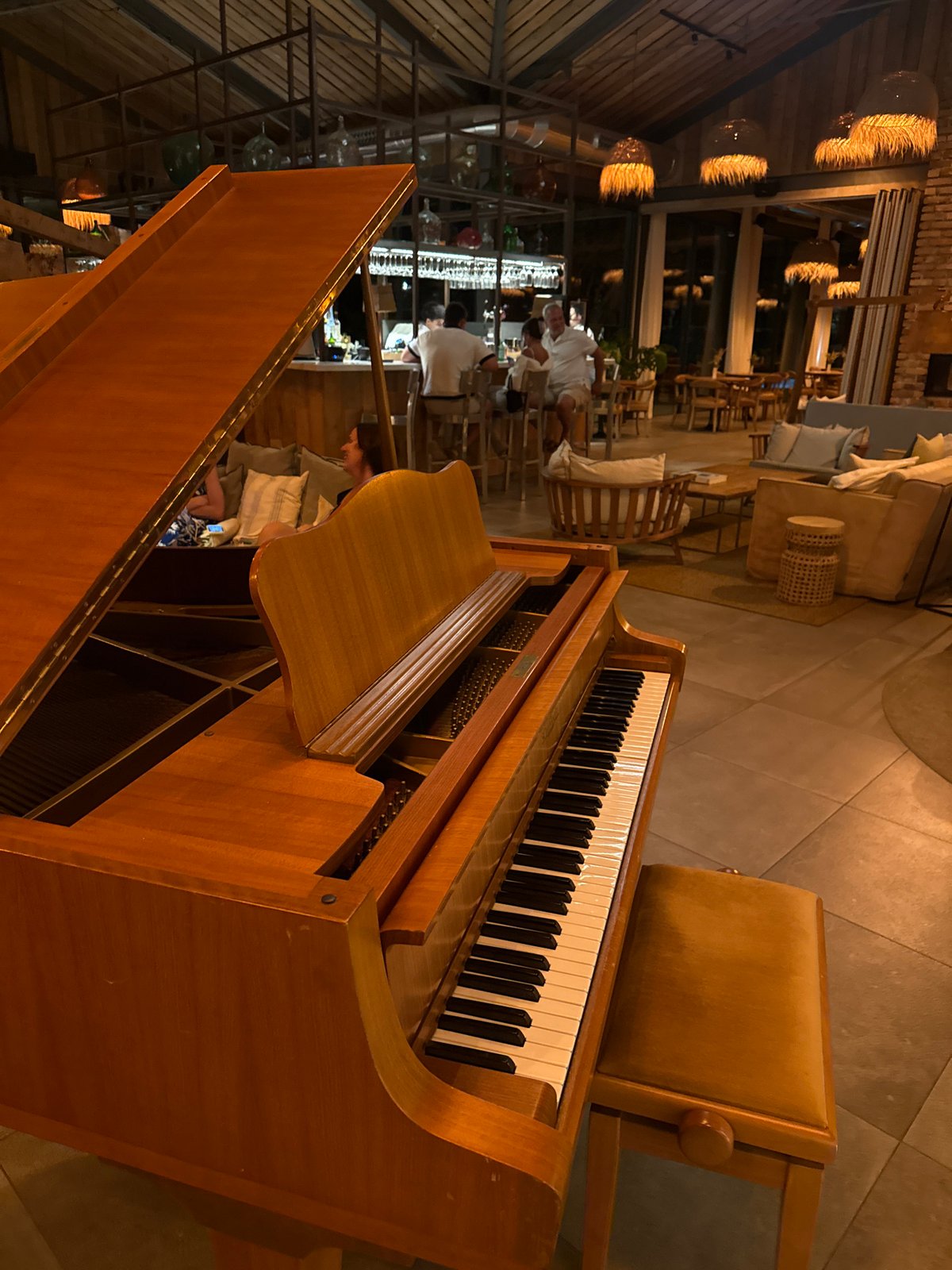 Upscale lounge interiors and a nighttime golf cart ride in Grândola