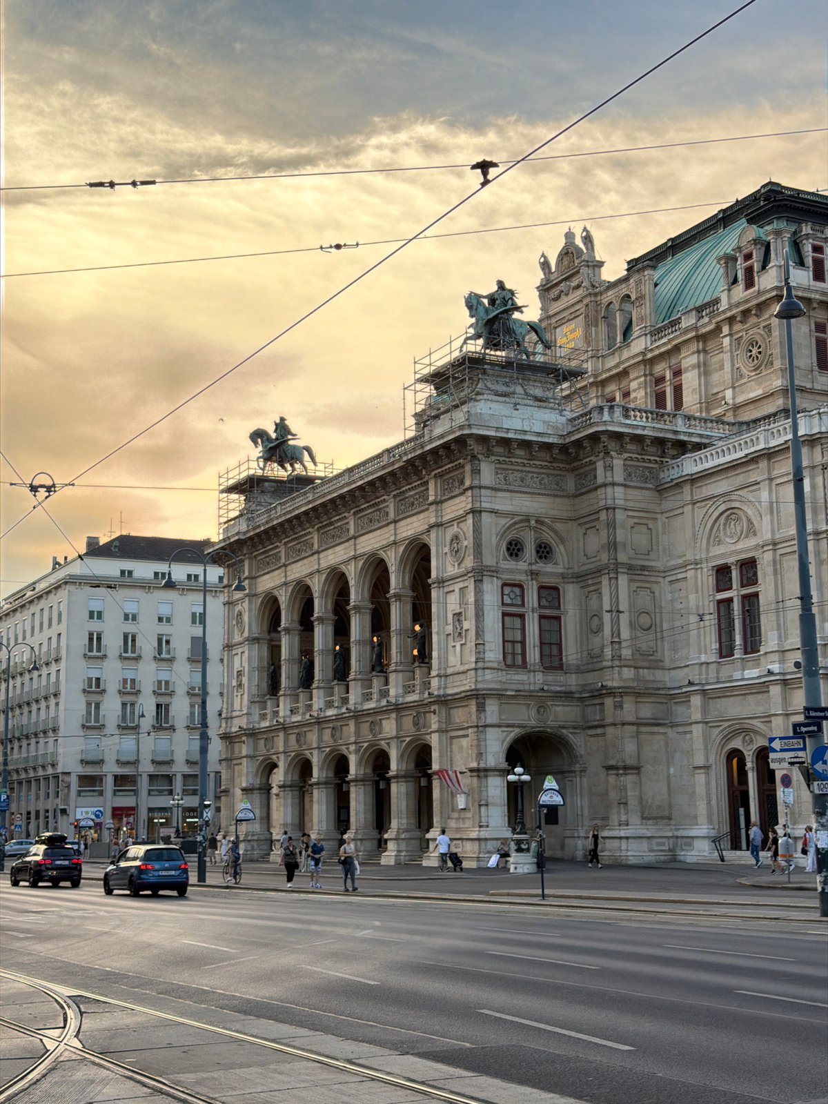 Street-level views of the Vienna State Opera at golden hour