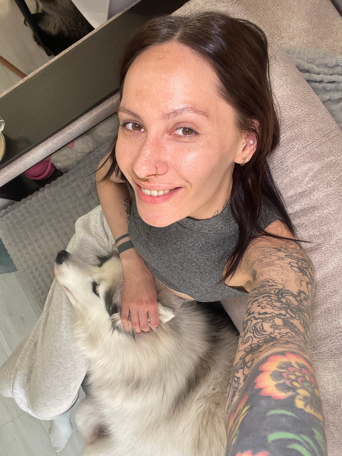 Woman takes selfie with husky dog in Izhevsk