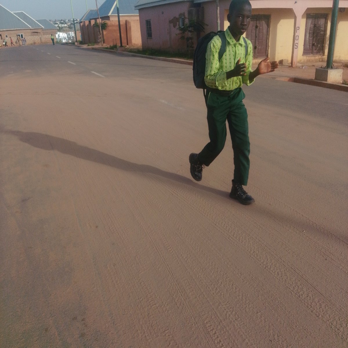 Morning foot traffic on the streets of a West African neighborhood