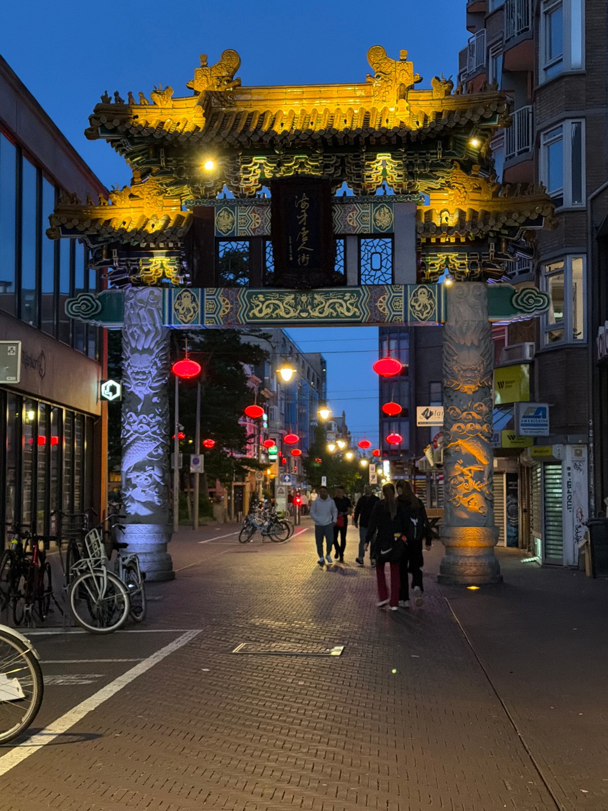 The Hague's Chinatown gate glows at dusk
