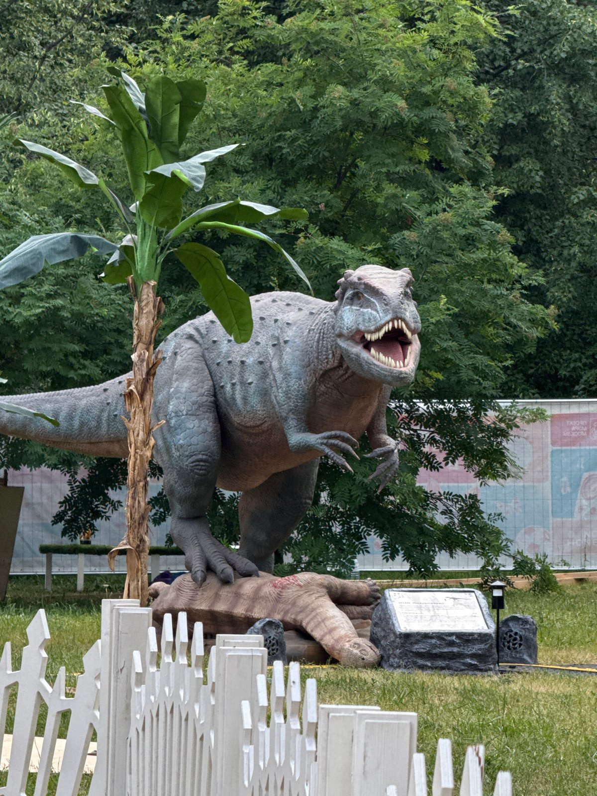 Moscow city scenes: dinosaur display, Soviet buildings, park sculpture
