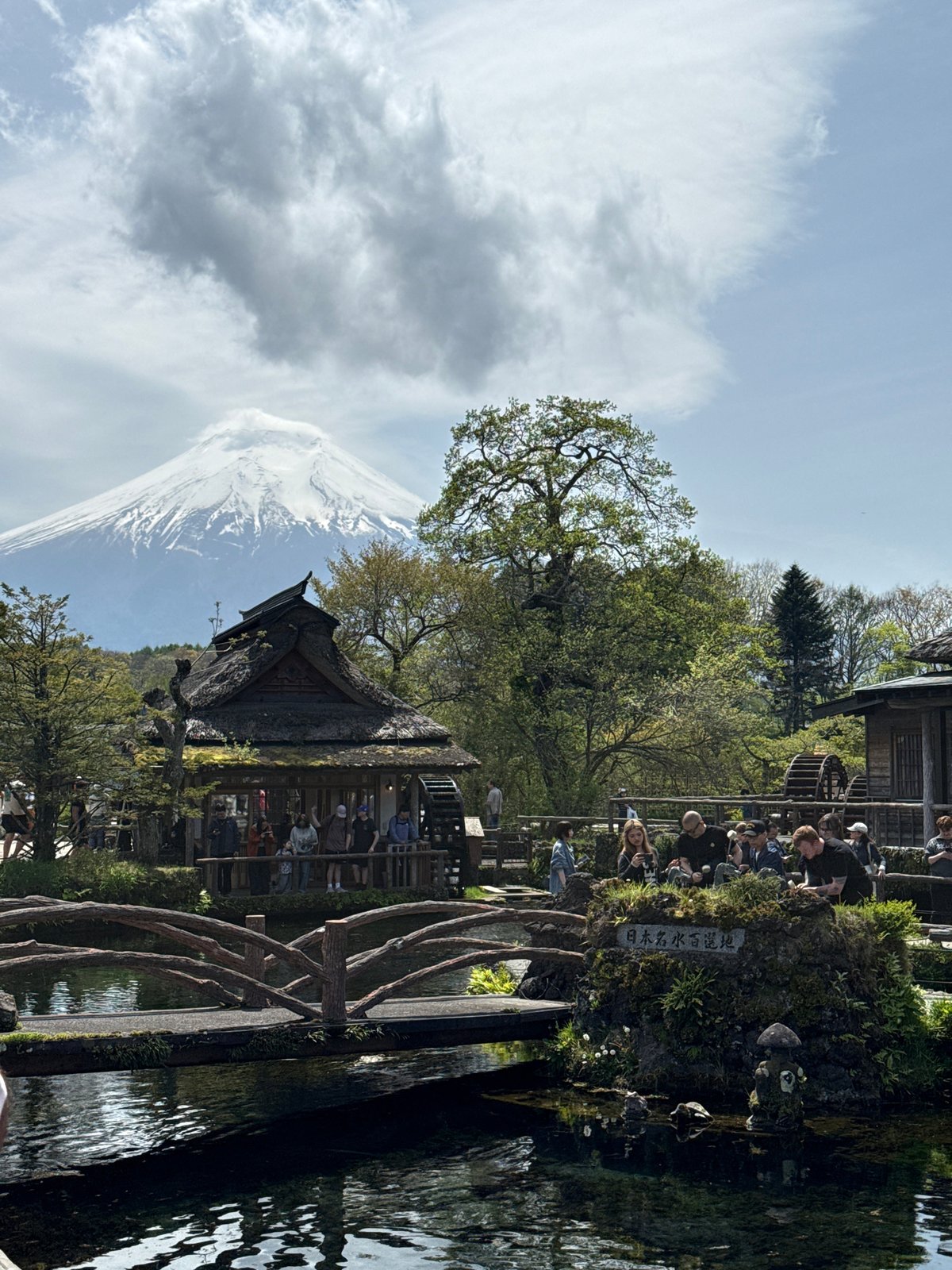 Tourist captures scenic Oshino Hakkai ponds with Mount Fuji backdrop