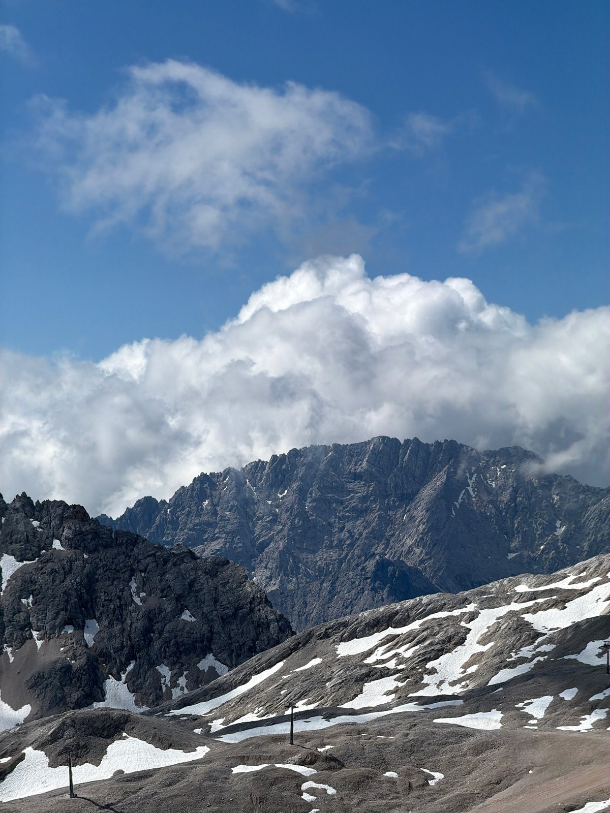 Alpine peaks and gondola near Garmisch-Partenkirchen on a summer morning