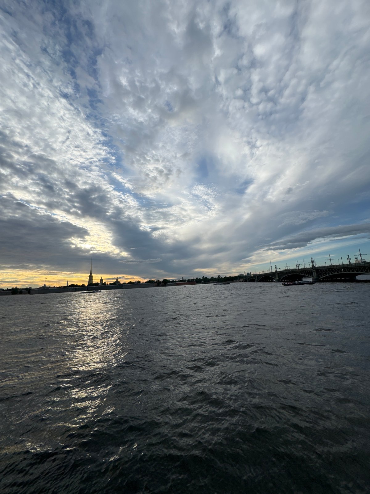 Neva River embankment at golden hour, Saint Petersburg