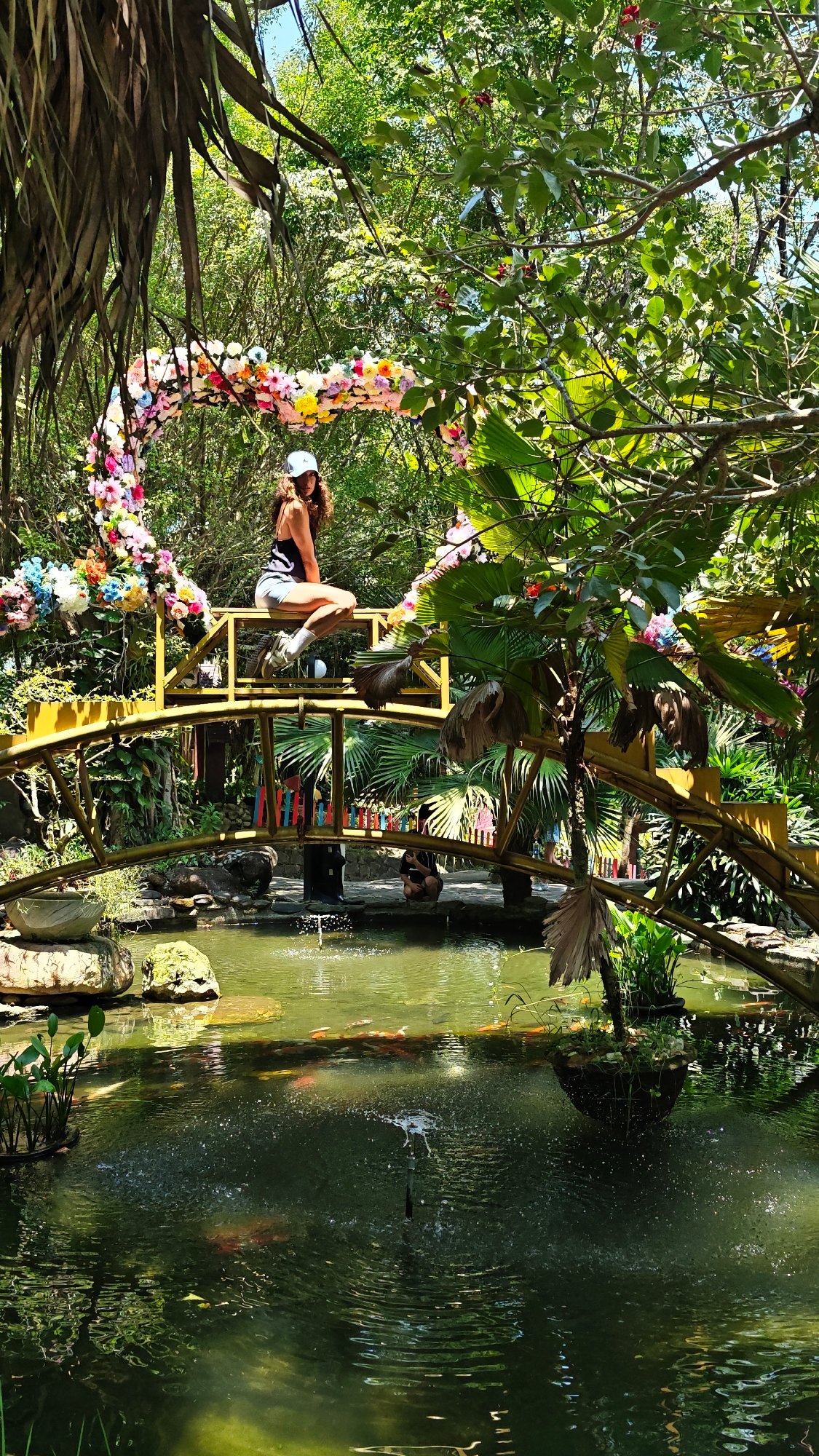 Tourist enjoys decorated bridge at Ba Na Hills Vietnam