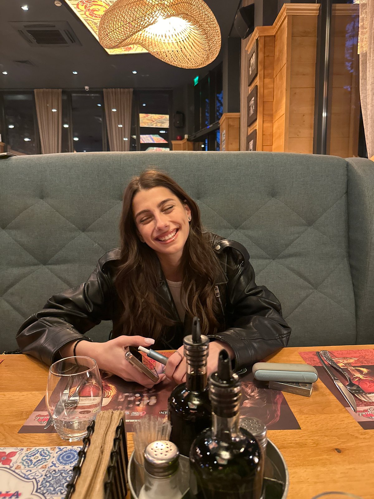 Woman dining at restaurant in Plovdiv, Bulgaria