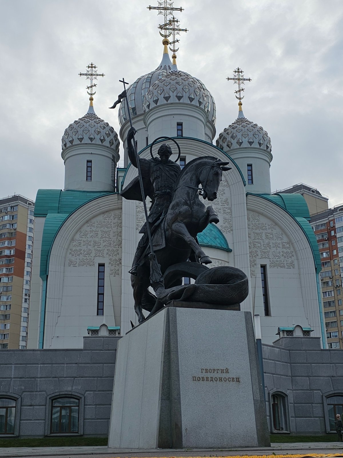 Church, reservoir promenade, and a weightlifting meet in Khimki