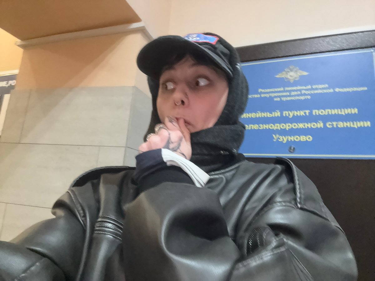 Person photographed in leather jacket at Uzunovo public building