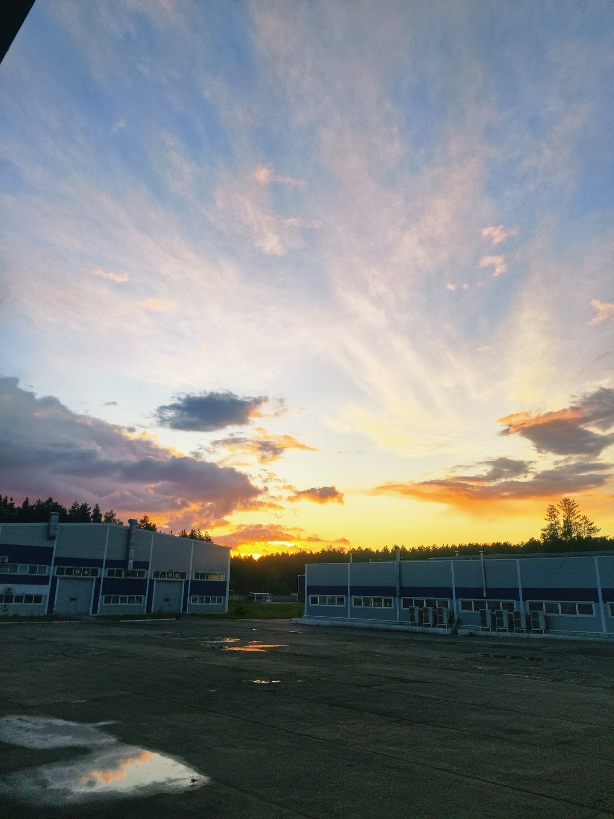 Twilight industrial buildings documented in Noviy, Russia