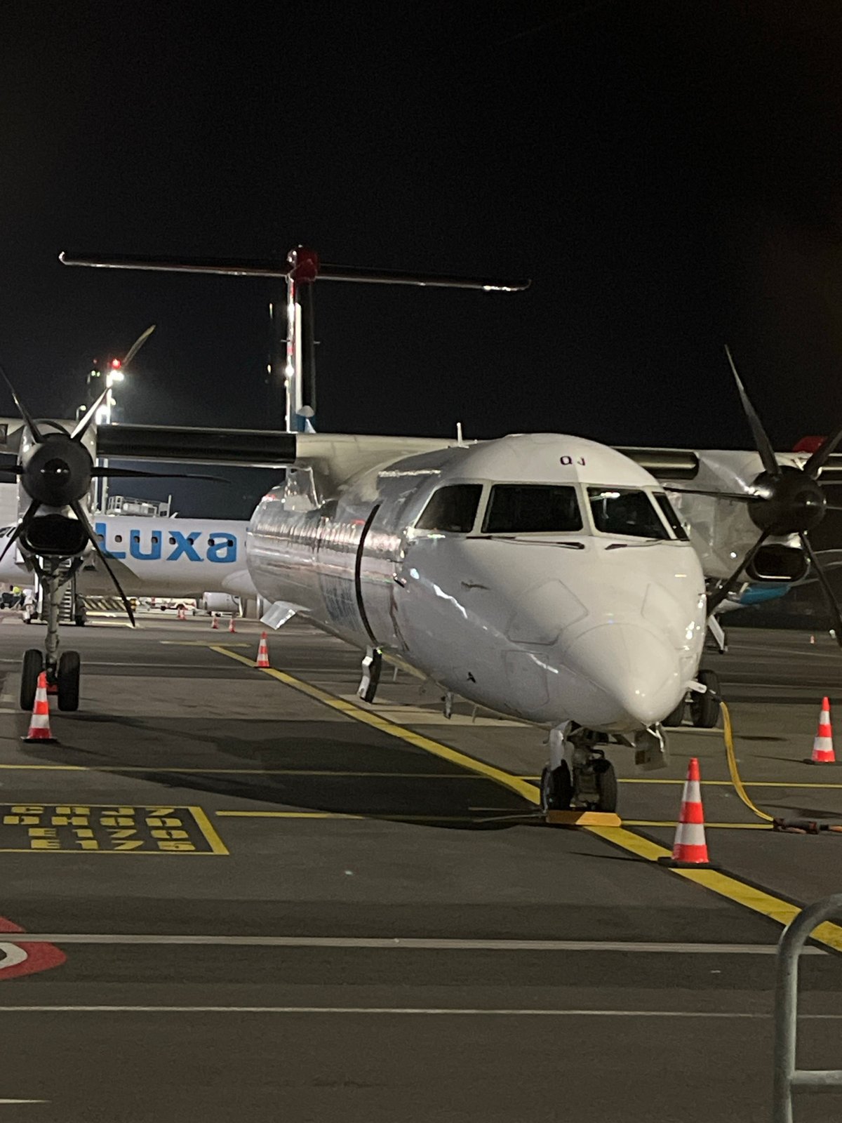 White turboprop airliner spotted parked at Luxembourg airport overnight
