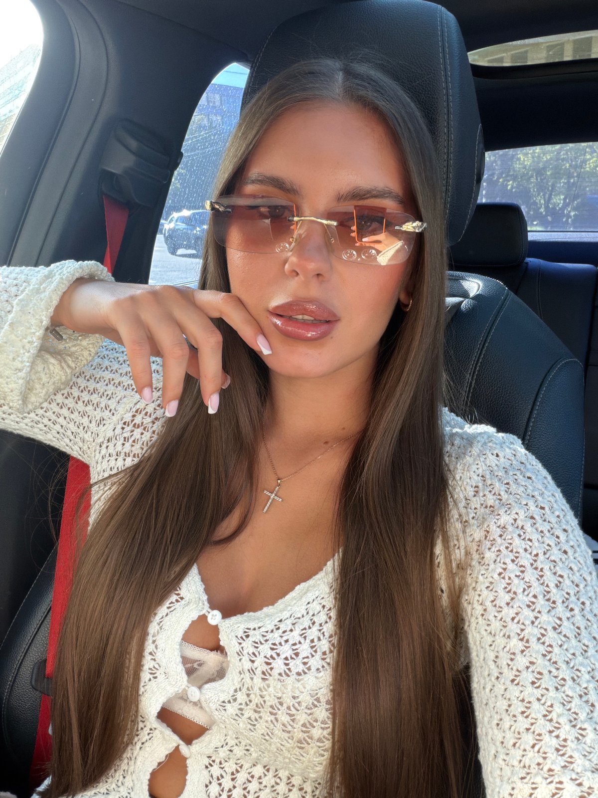 Woman photographed in car passenger seat in Krasnoyarsk