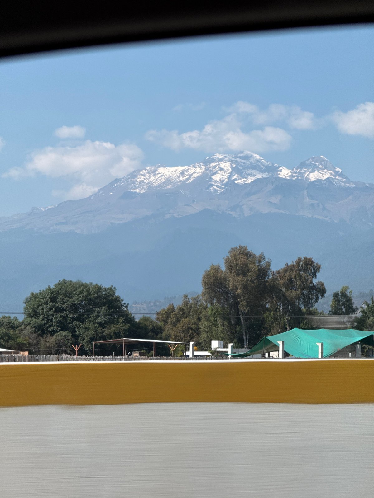 Snow-capped mountains viewed from San Matías Tlalancaleca, Mexico