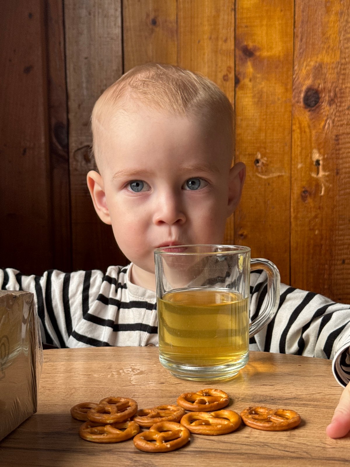 Toddler enjoys late-night snack in rural Russian village