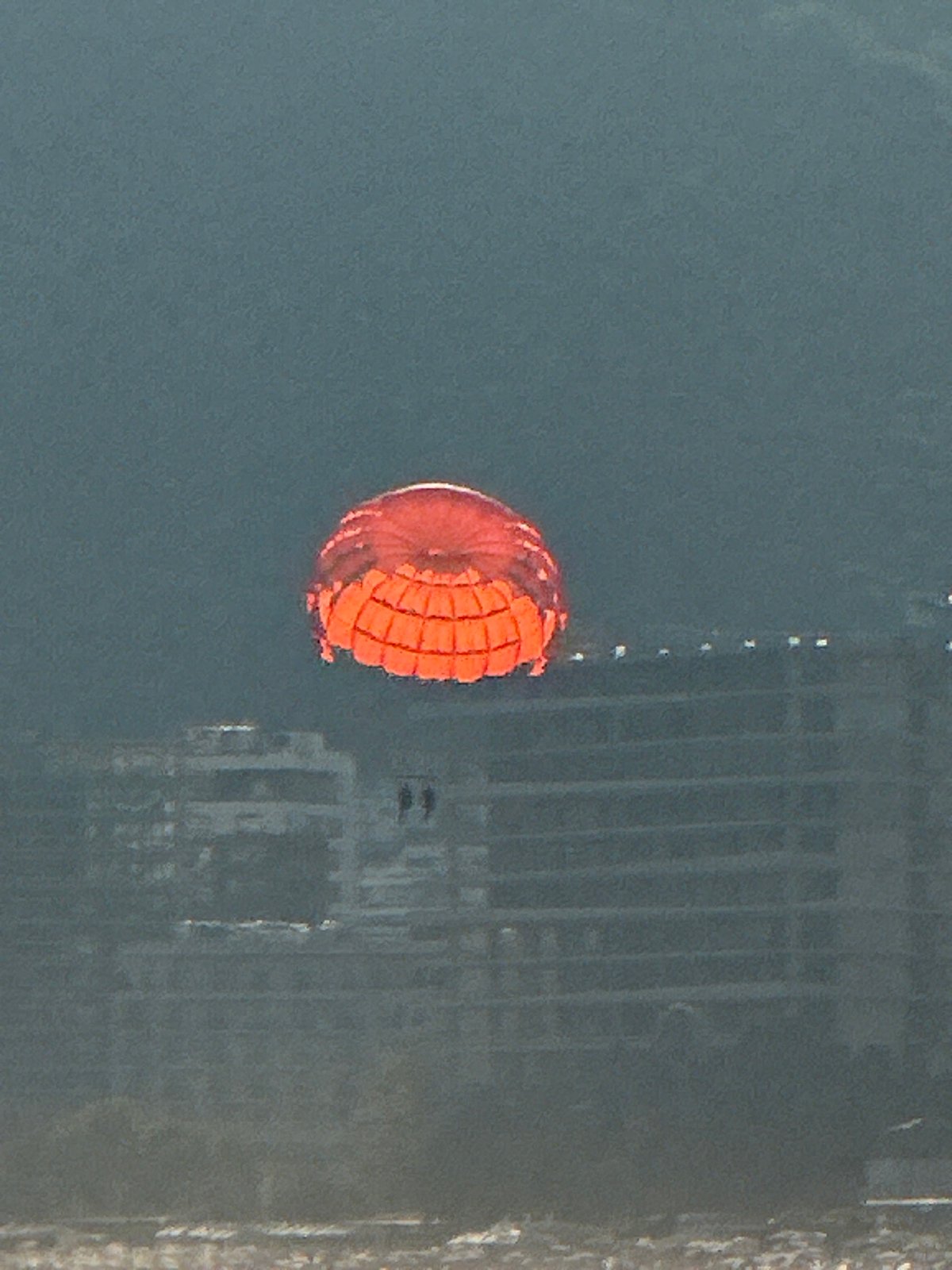 Parasailing and boats fill a busy Budva afternoon on the Adriatic