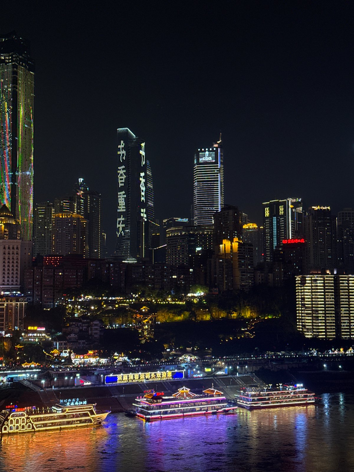Chongqing's Yuzhong District nighttime skyline documented by witness