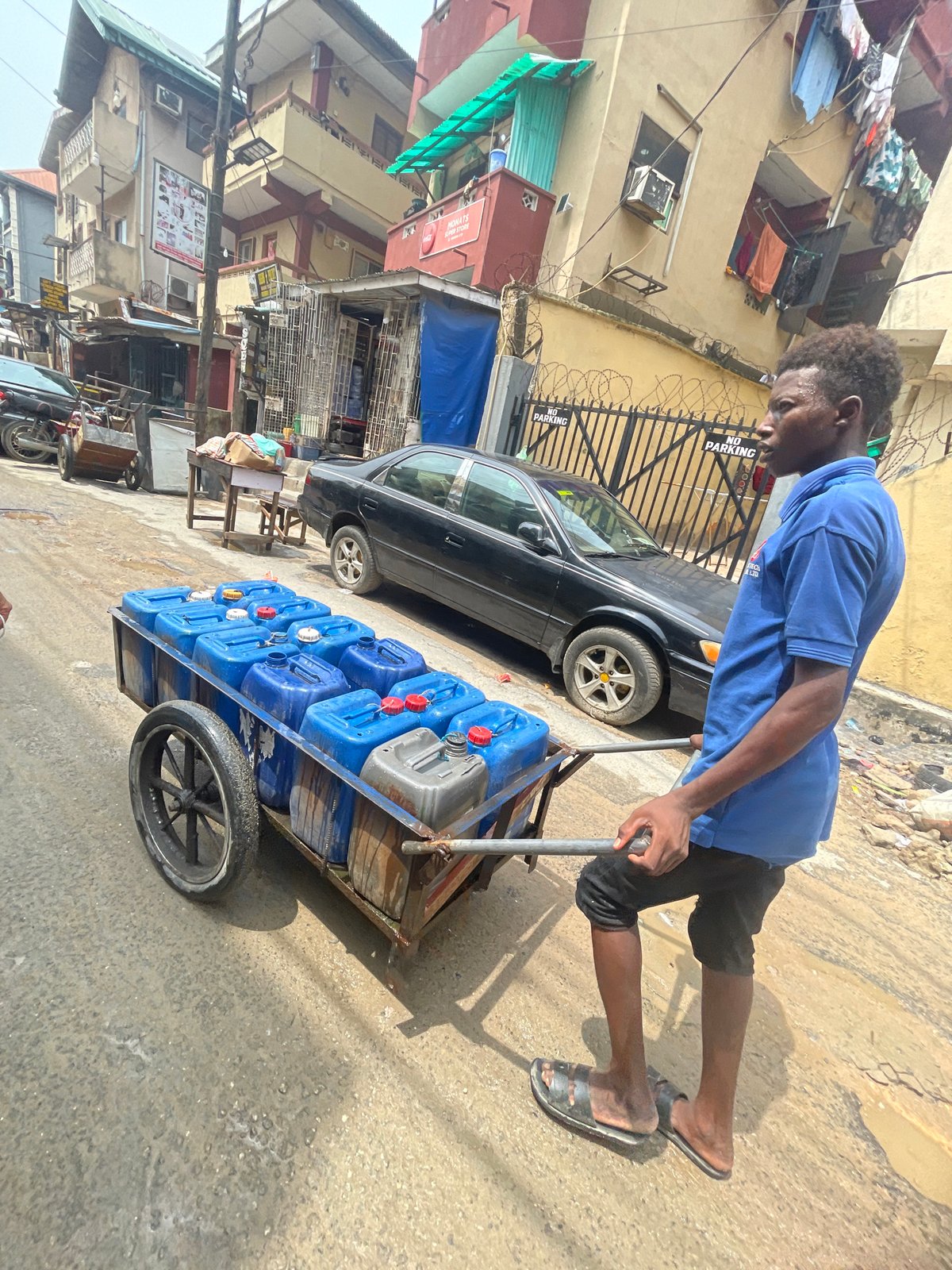 Street vendors conduct daily business across Lagos neighborhoods