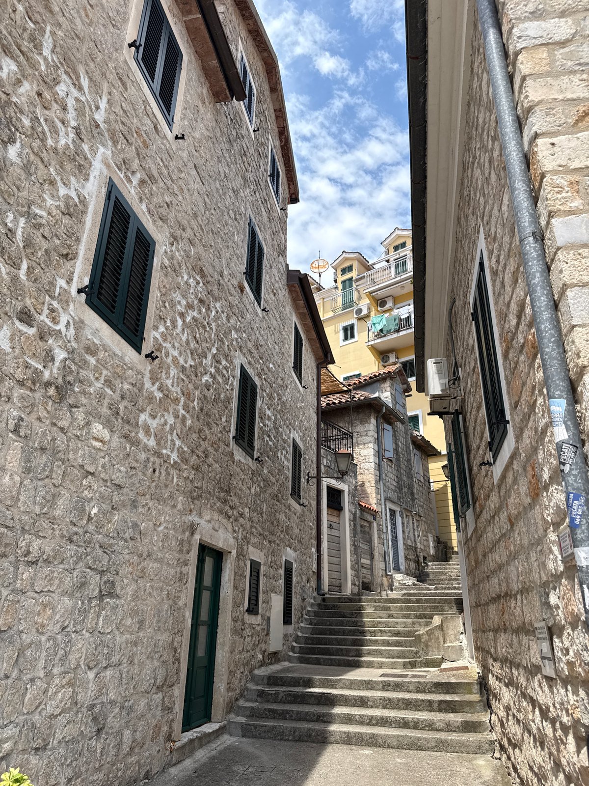 Exploring Herceg Novi's stone old town on a summer morning