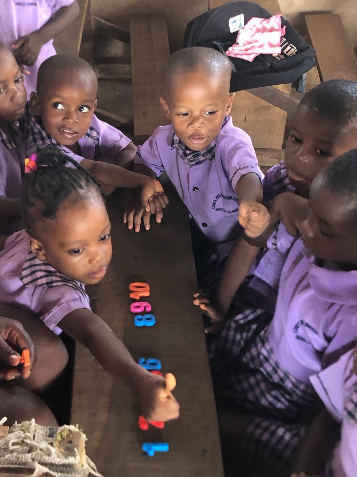 Primary school students attend morning classes in Ukwu-Abwa, Nigeria