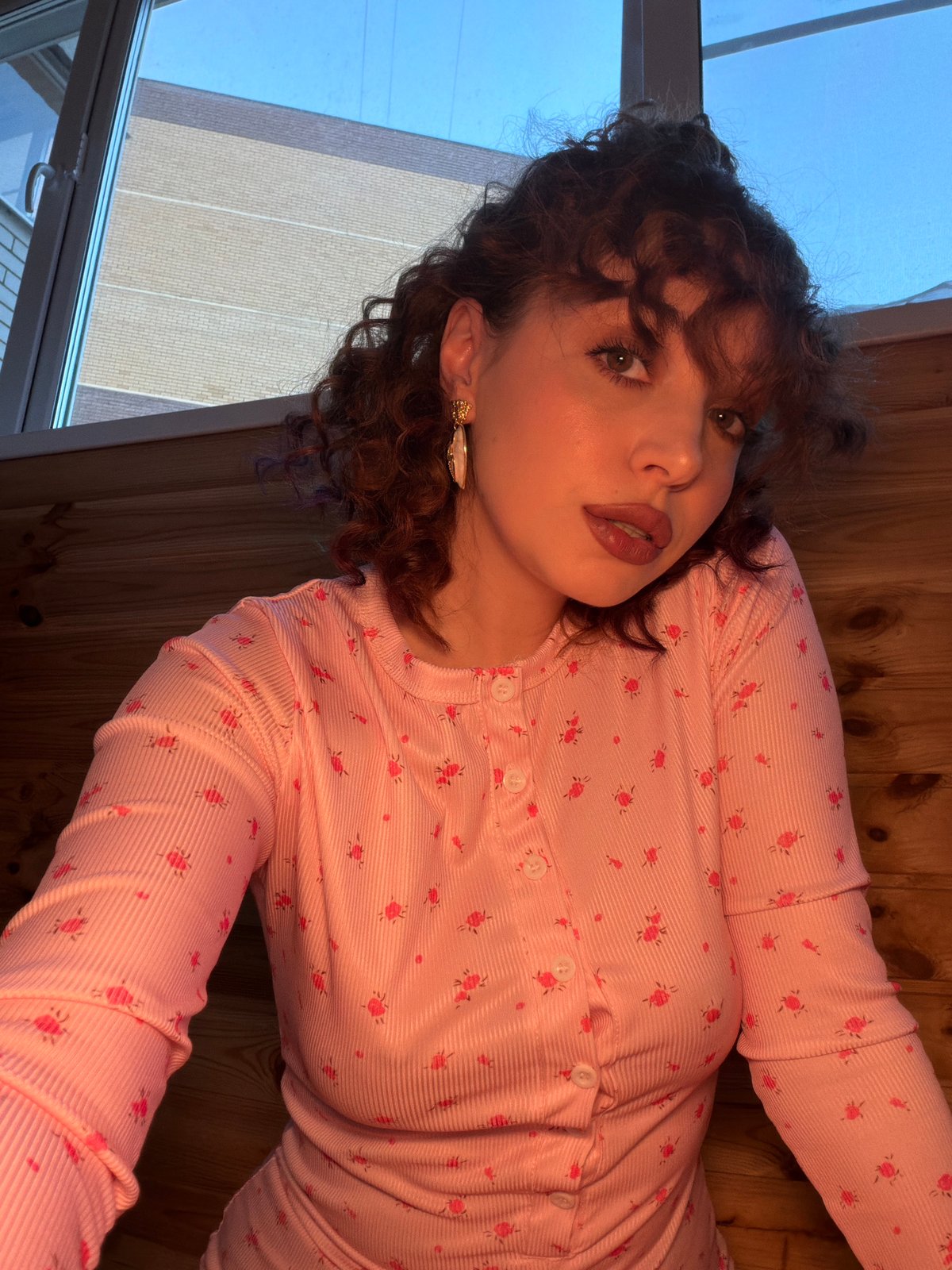 Casual indoor self-portrait session with outfit changes