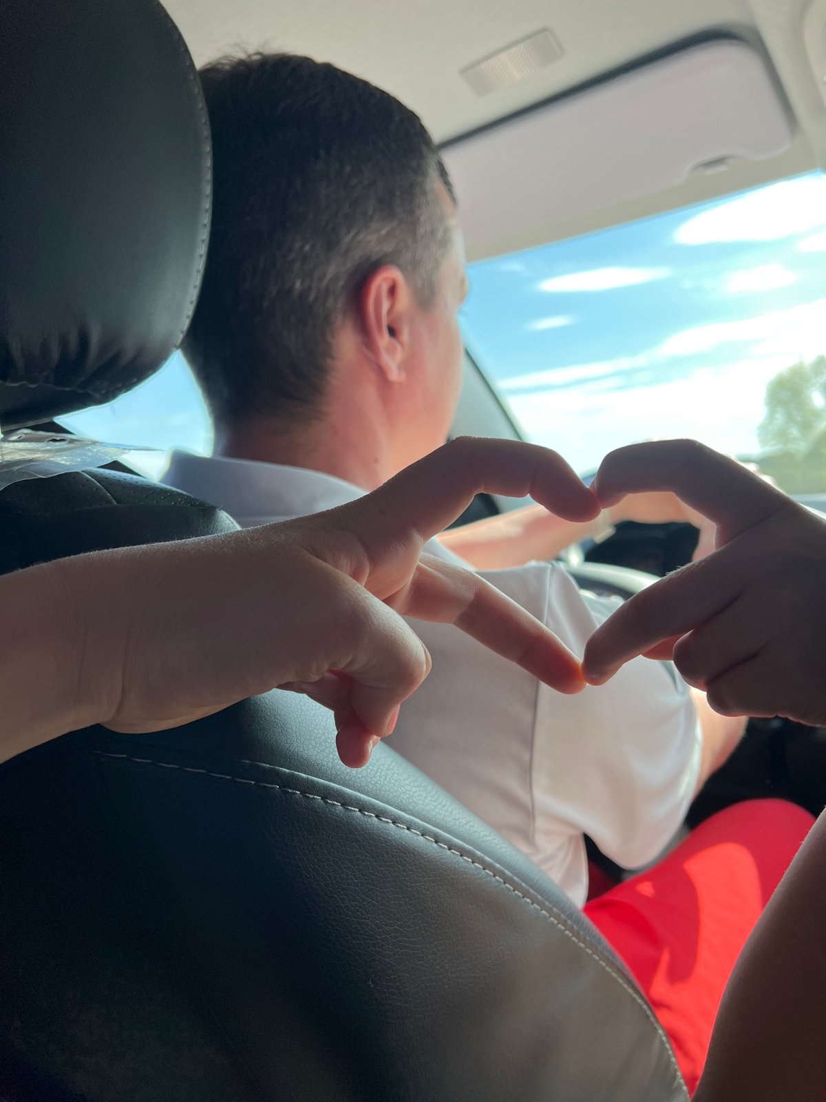 Intimate moment captured between couple in vehicle in Niva