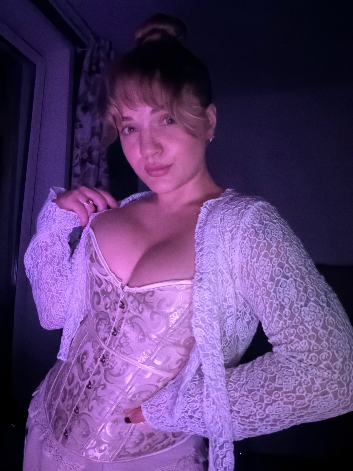 Young woman photographed indoors in Большая Шильна, Russia