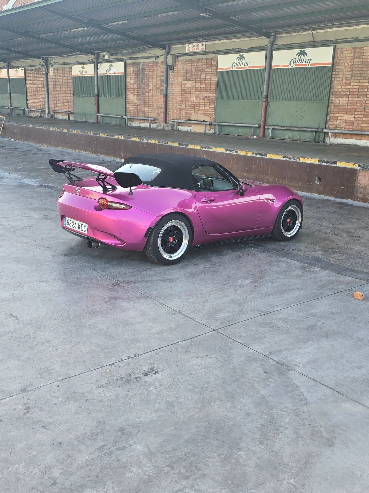 Pink convertible sports car spotted parked in Barcelona