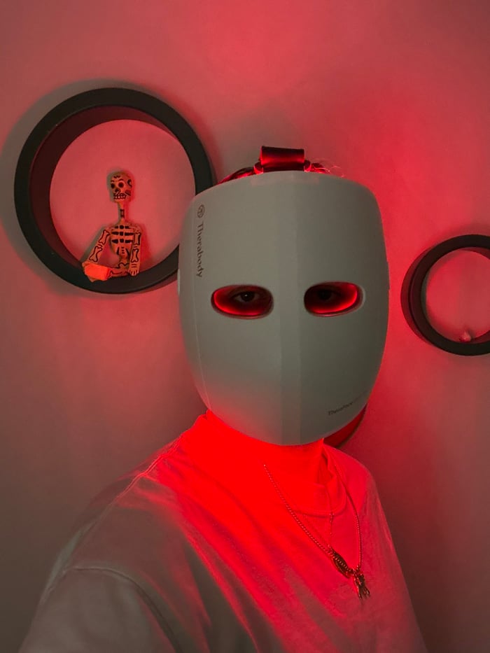 London resident uses LED face mask in personal wellness session