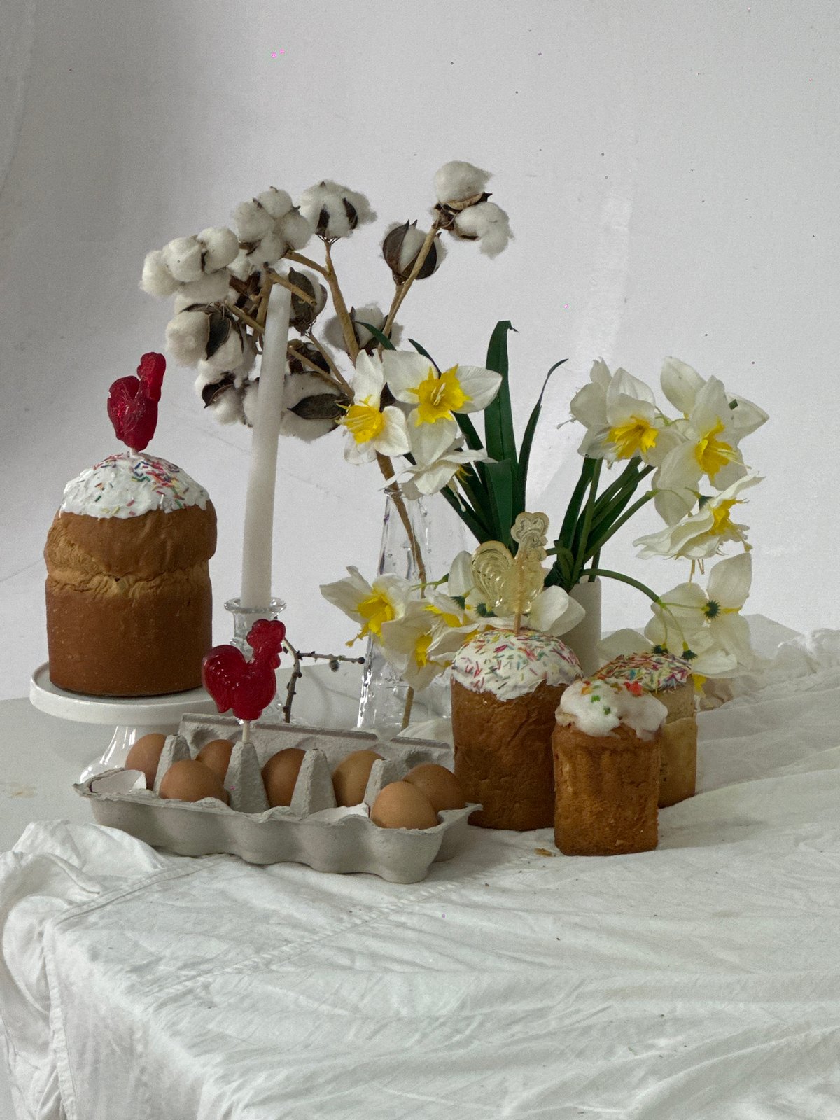 Child celebrates Easter morning with decorated eggs in Chaikovsky