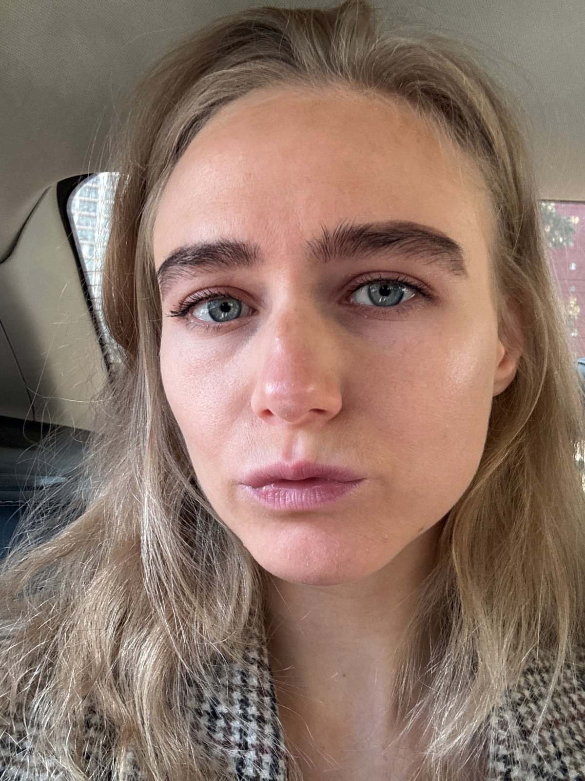 Woman photographed in portrait and vehicle at same location