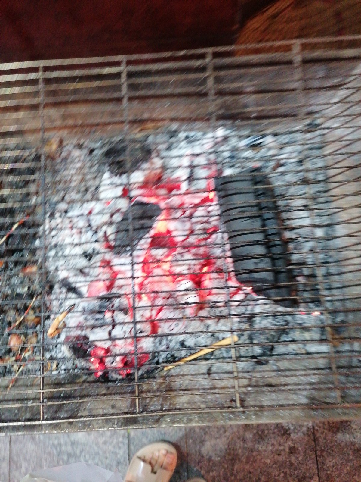 Outdoor grilling captured near LOUISARE business in Nha Trang