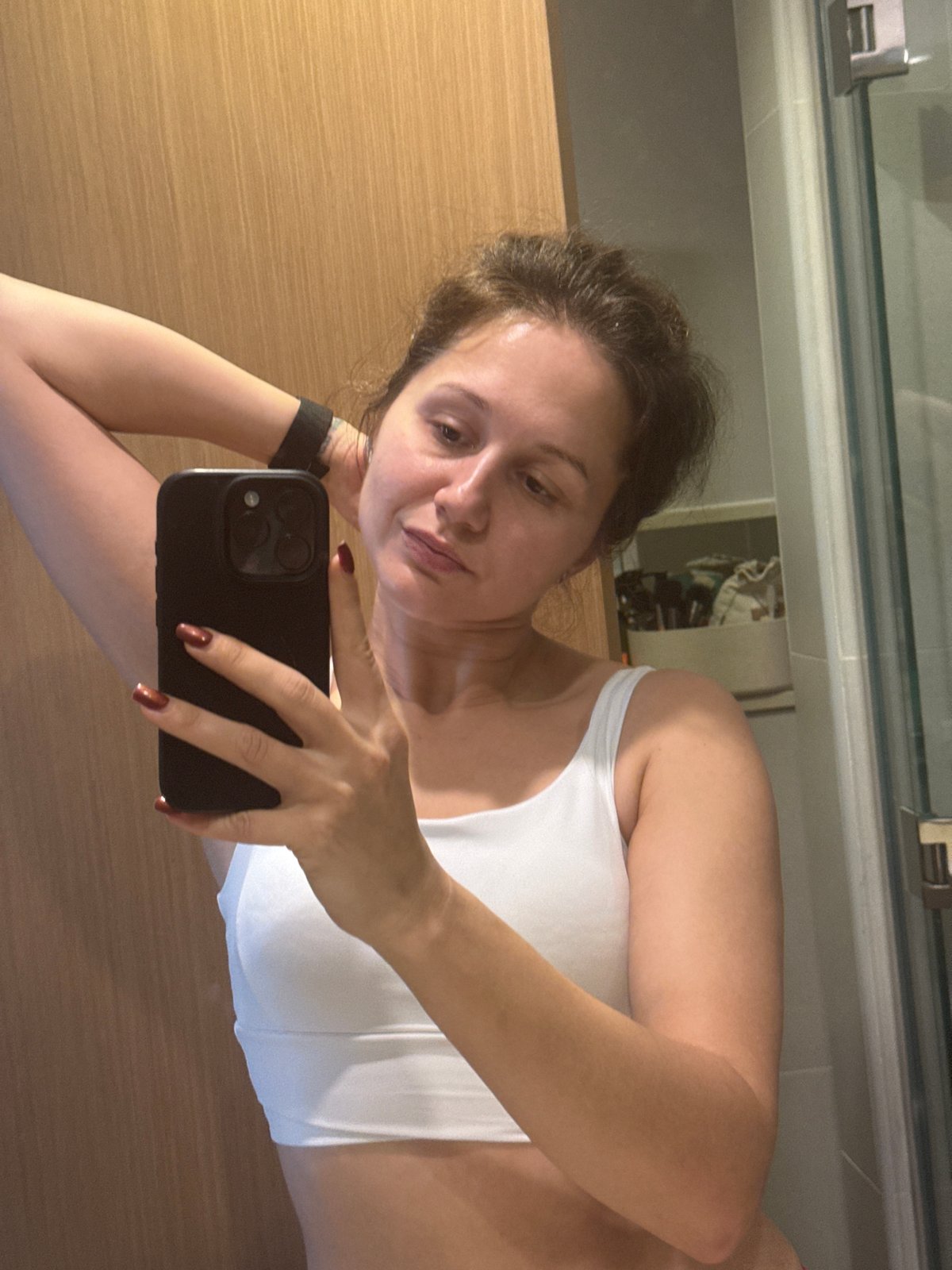 Woman takes bathroom selfie in Dubai early morning