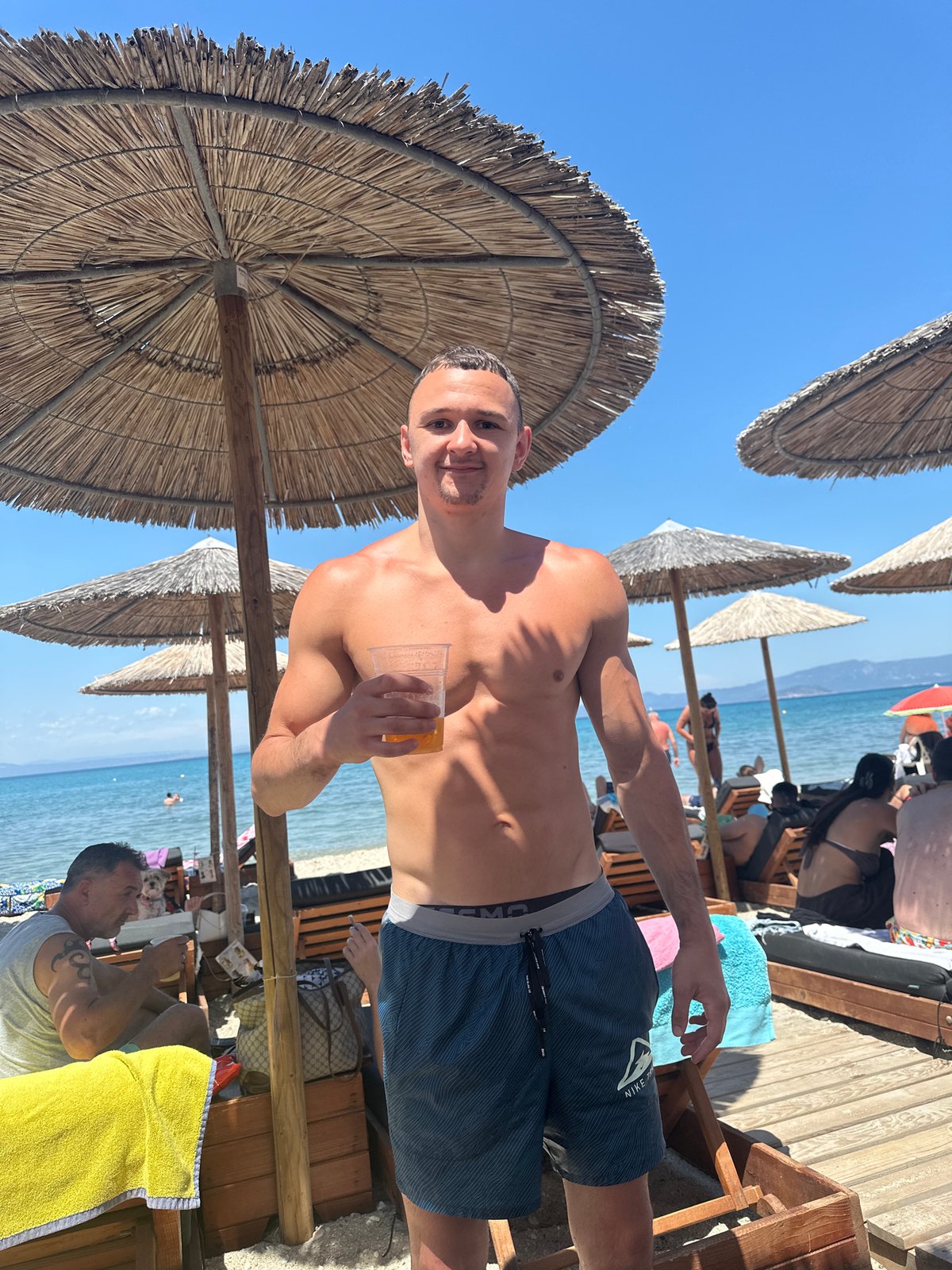 Sunday beach day unfolds at Greek coastal resort