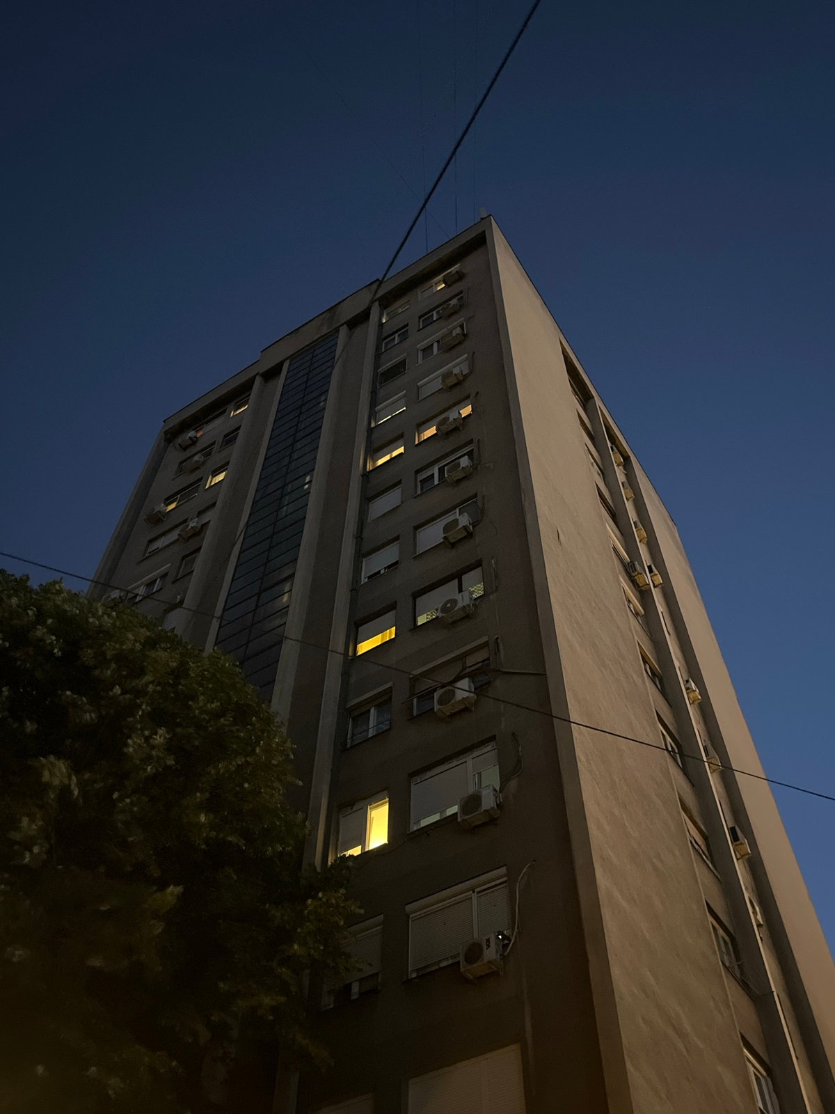 Nighttime residential building documentation in Belgrade captured by witness