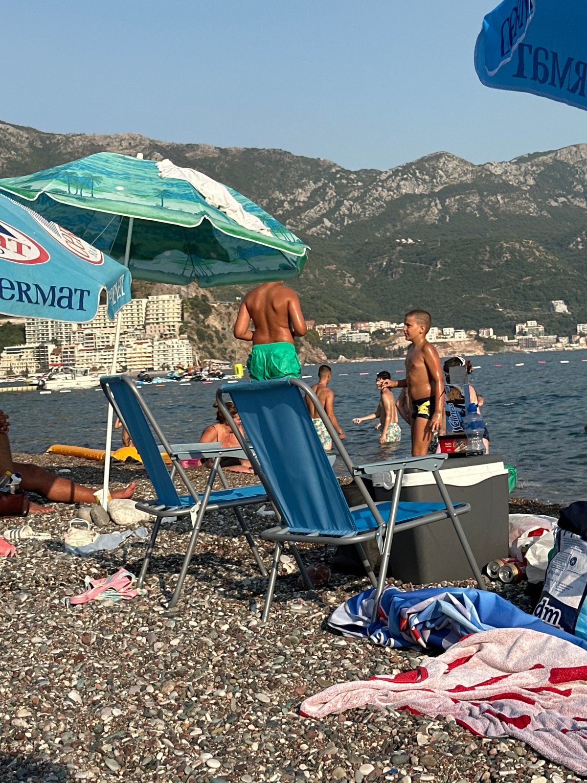 Parasailing and paragliding in full swing over Boreti, Montenegro