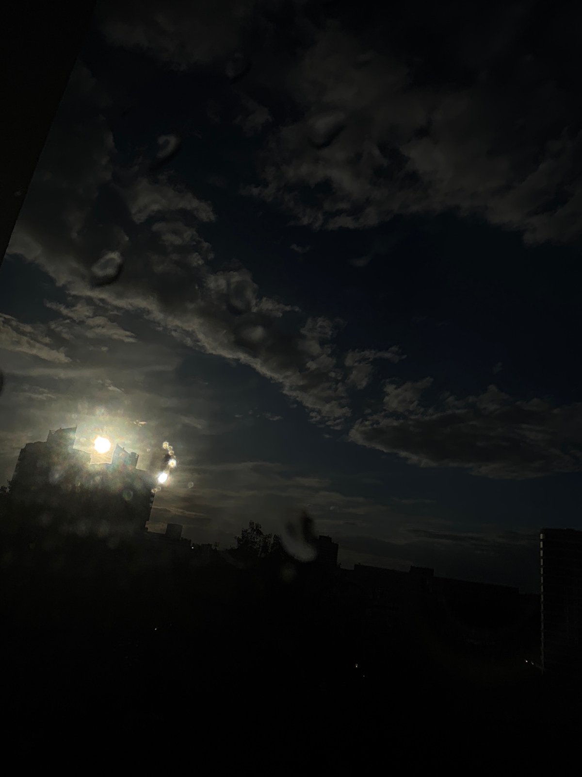 Dramatic sky transition from storm clouds to sunshine over Minsk