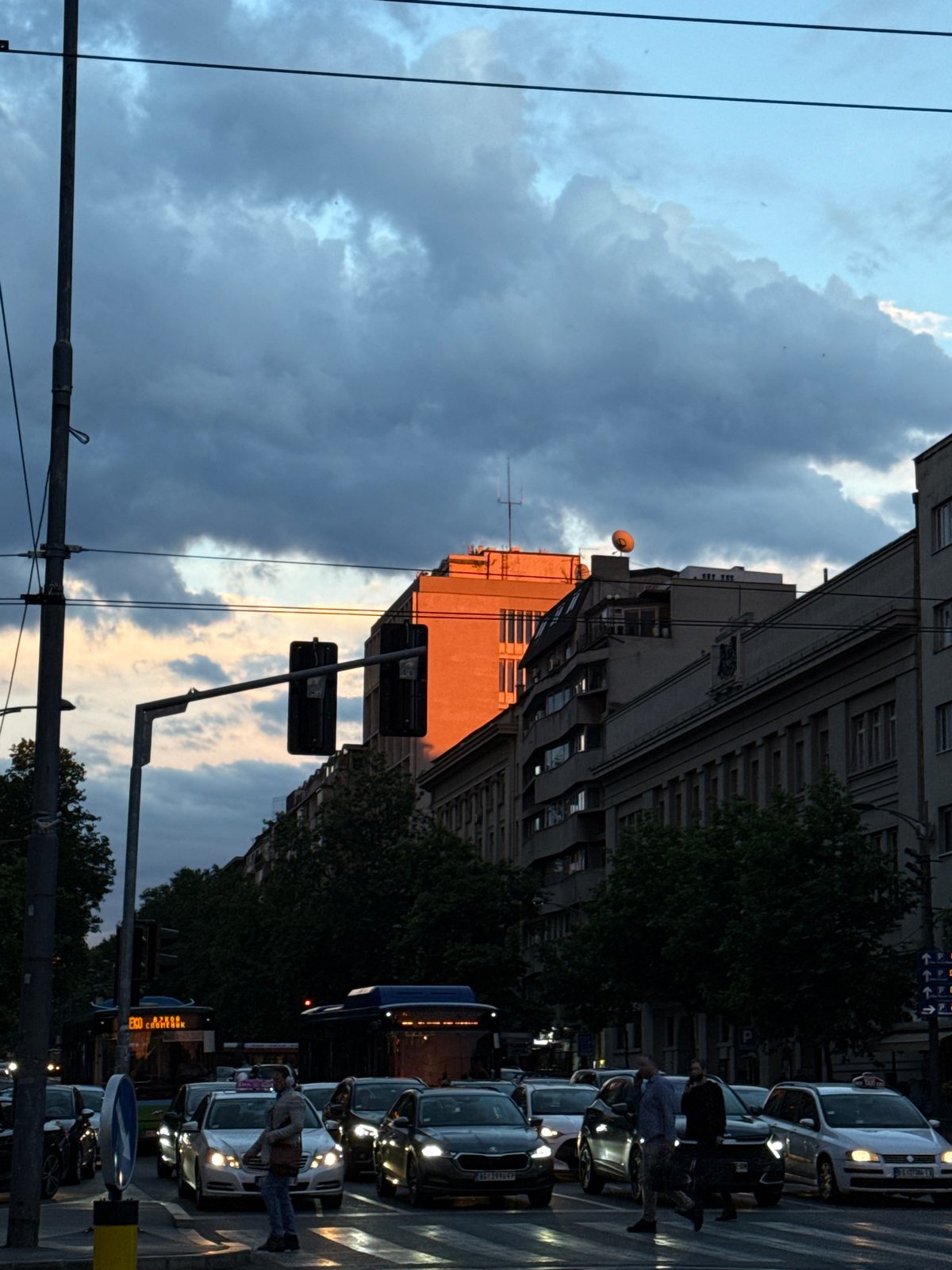 Belgrade city center at dusk, golden hour to storm clouds