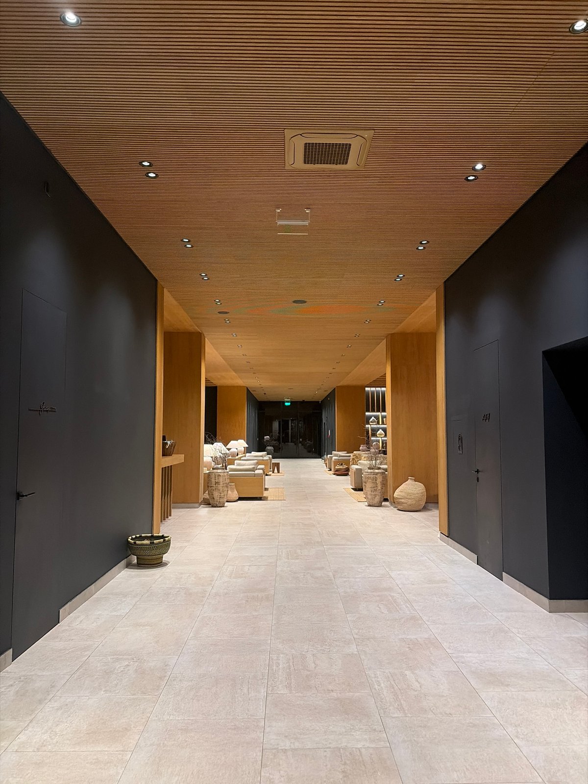 Museum visitor documents art and pottery exhibits in Svilengrad