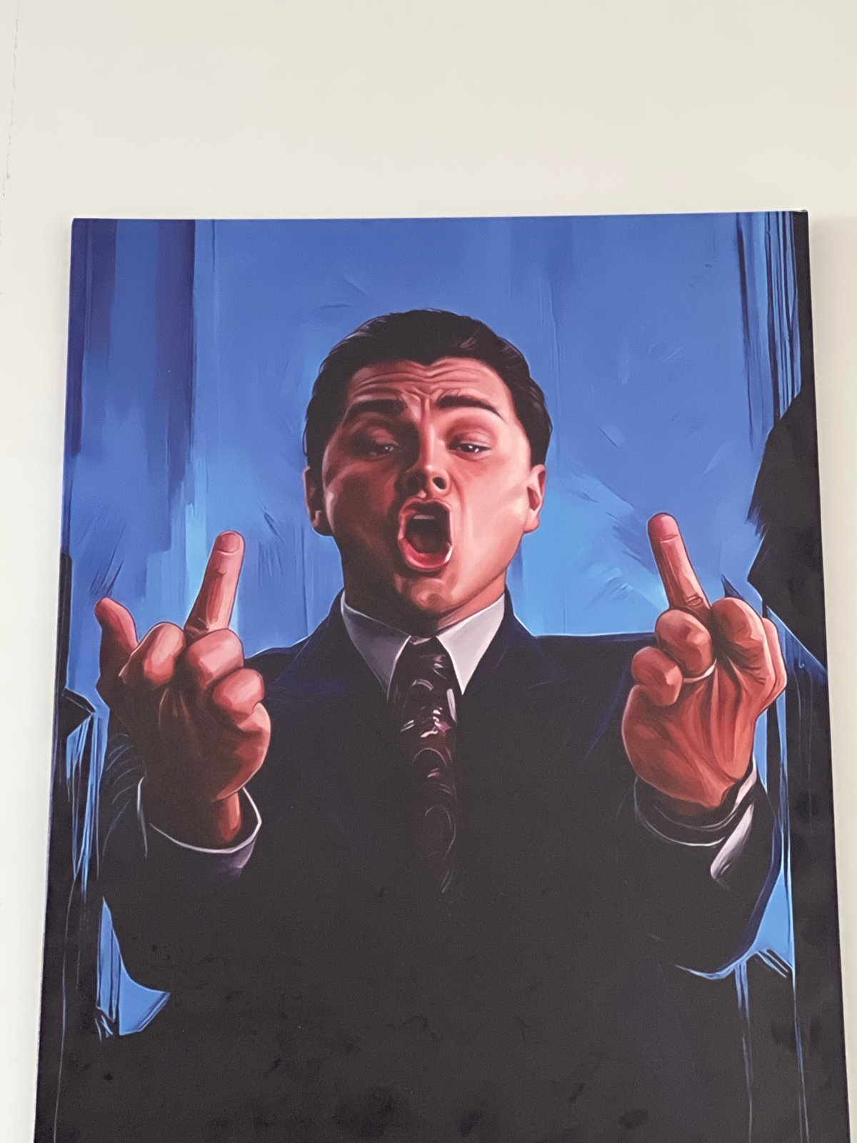 Canvas artwork shows suited man making obscene gesture in Astana