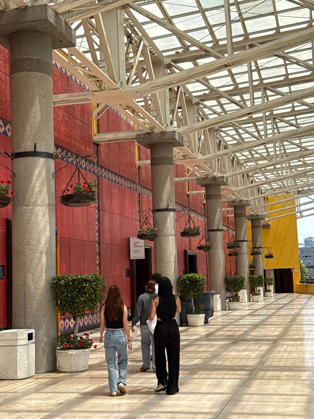 Visitor documents colonial architecture at Puebla public building
