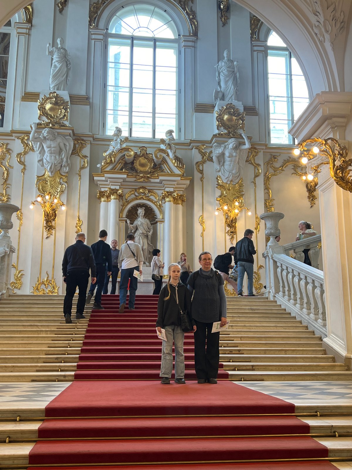 Tour guide leads group through Hermitage's Jordan Staircase