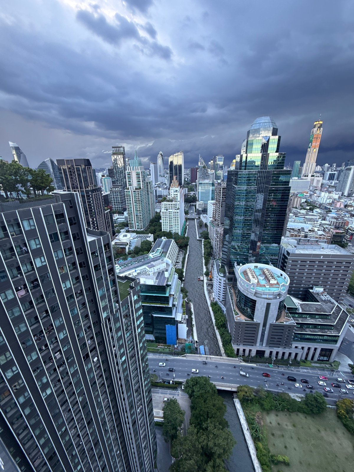 Bangkok skyline under stormy skies, July 2026