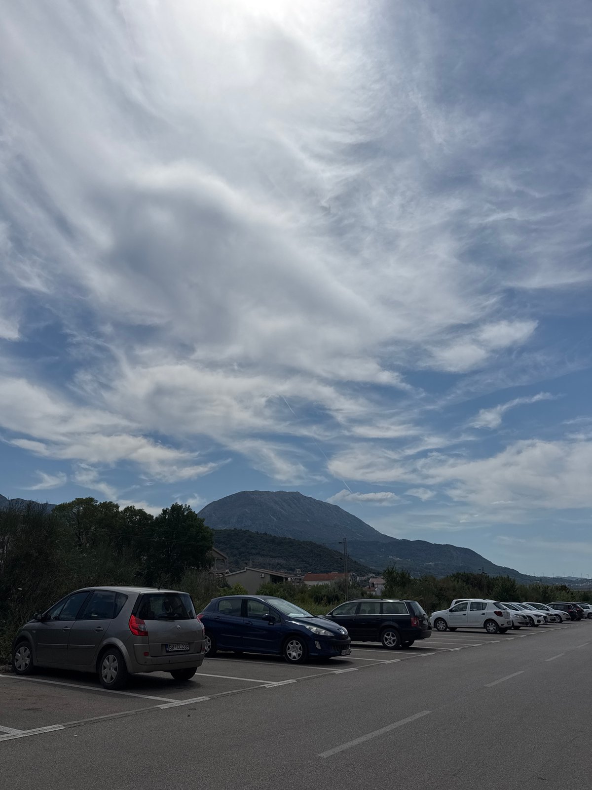 Parking lot in Bar, Montenegro, mountains looming behind