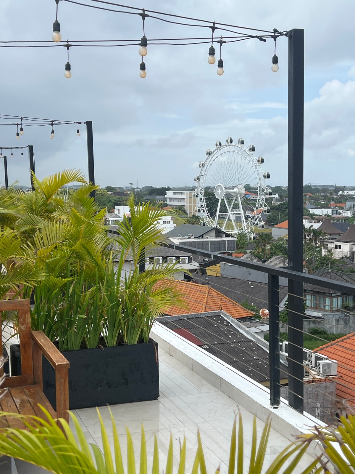 Rooftop views capture North Kuta's tropical cityscape and attractions