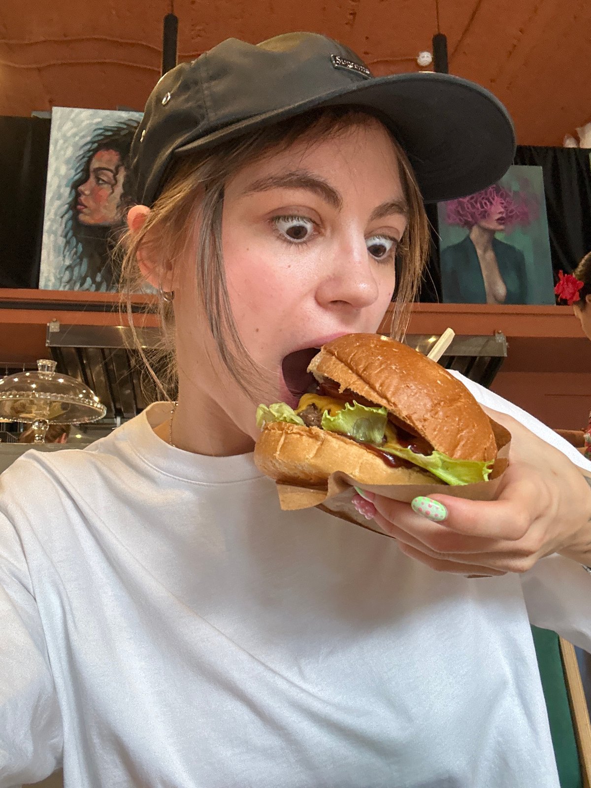 Lunch break at a Moscow restaurant, burgers and pasta.