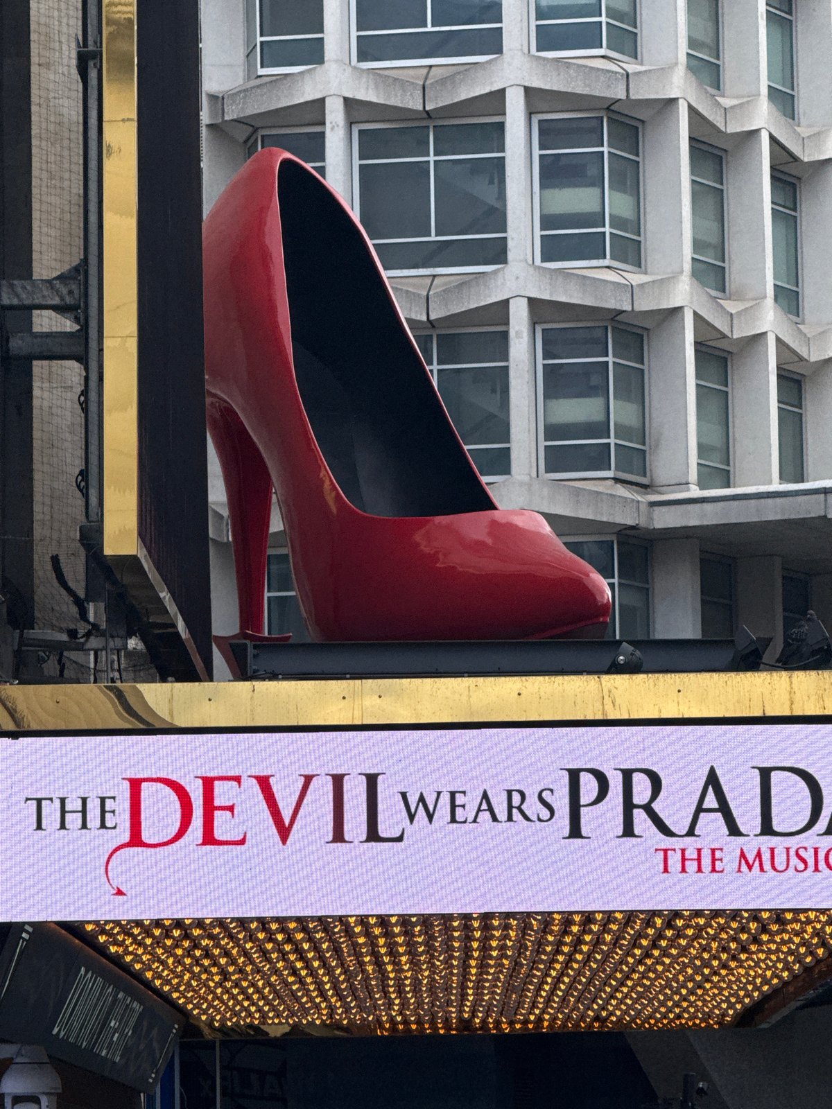 London witness documents red shoe sculpture, commercial storefronts