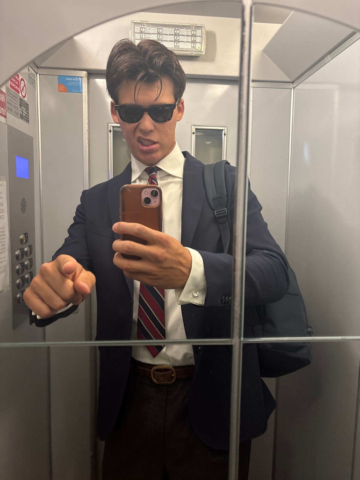 Elevator selfie in Milan, suited up and ready to go