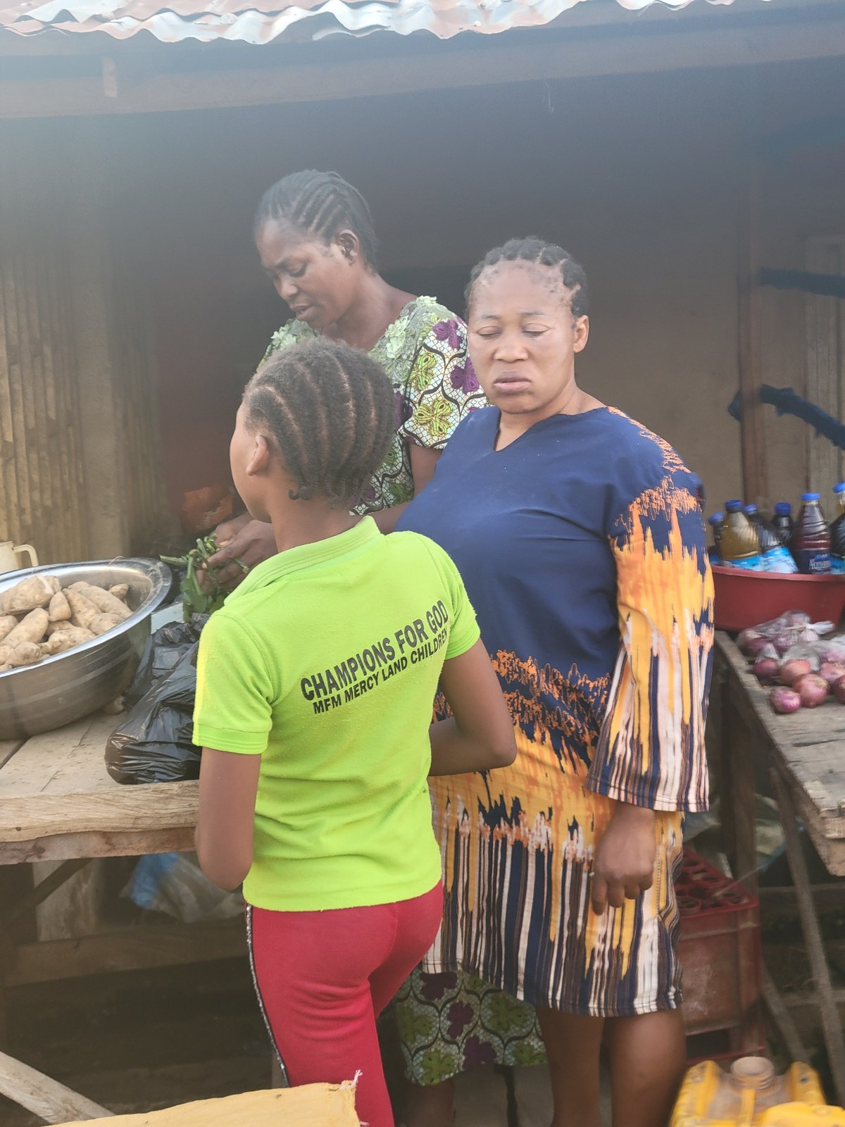 Daily market life unfolds across Nigerian communities