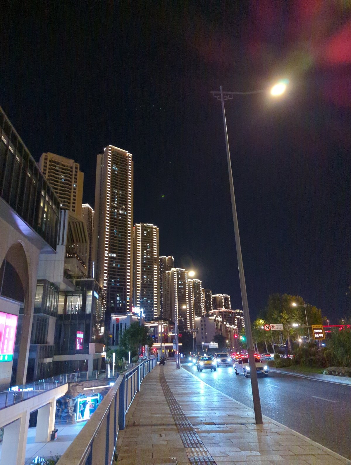 Jiangbeicheng at night: skyline, bridges, and street traffic