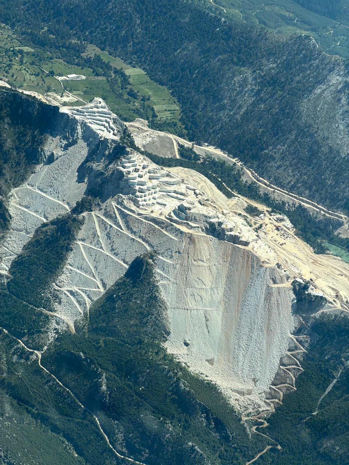 Aerial documentation captures active quarry operations in Kazakhstan mountains